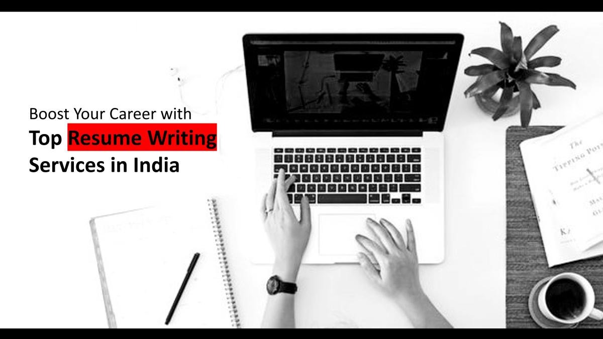 Workstation with laptop, notepad, and text about resume writing services.